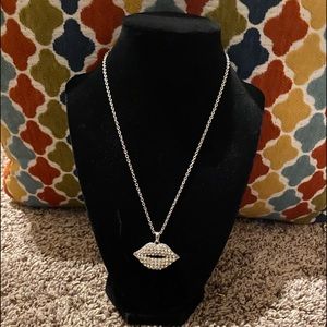 Puffy lip (fake) diamond necklace.